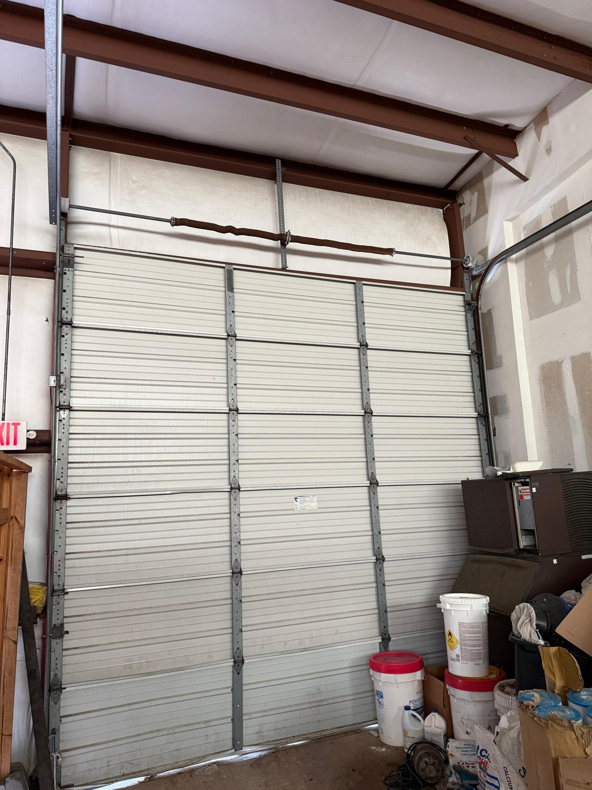 Commercial loading dock door repaired by a TikTak technician
