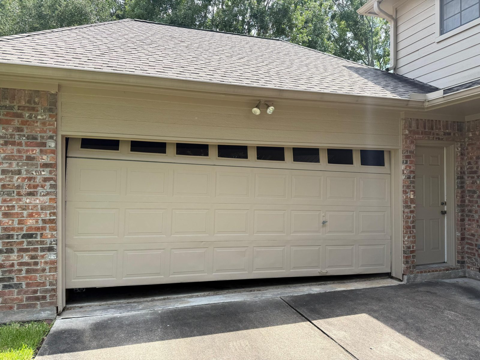 Insulated garage door installed by TikTak on a Cypress, TX home